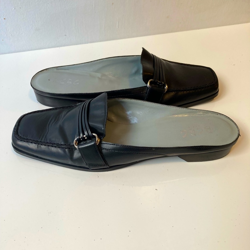 BCBG black leather mules